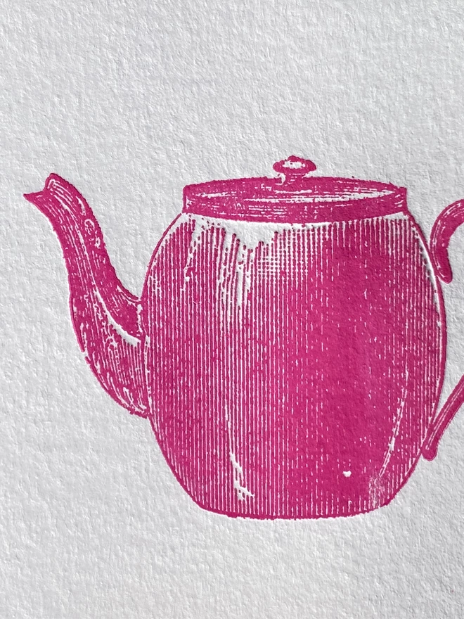 Close up of a pink illustration of a tea pot