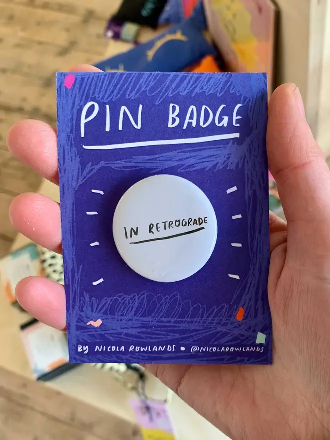 Badge reads 'in retrograde'
