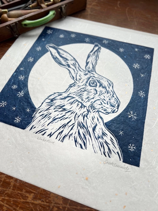 hare, snowflakes and full moon linocut