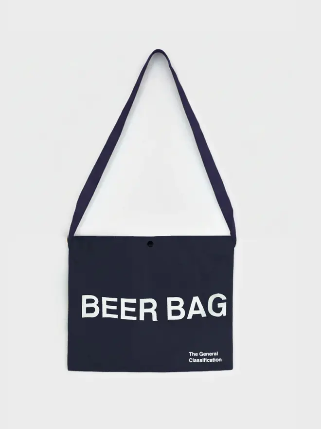 'Beer Bag' Musette Bag, against a grey background. 