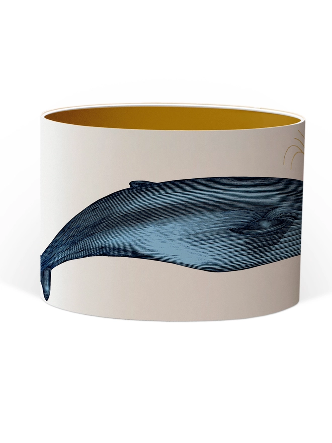 Handmade blue whale lampshade with gold details featuring vintage inspired ocean artwork