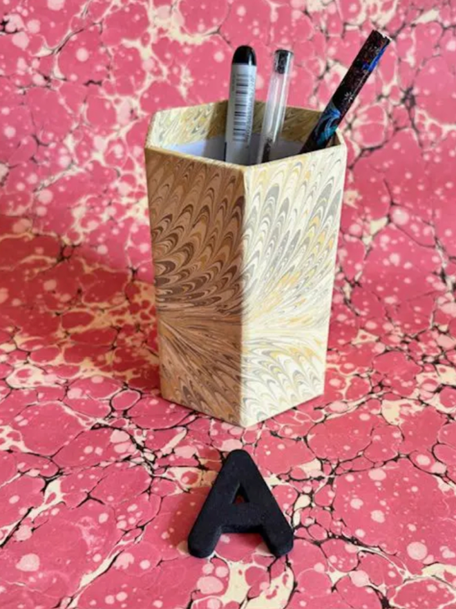 Pen Pot. A pen pot in A.