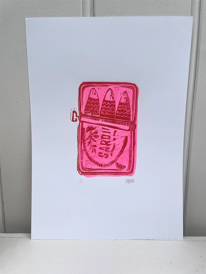 A4 Lino printed sardine tin in pops of bright neon and red