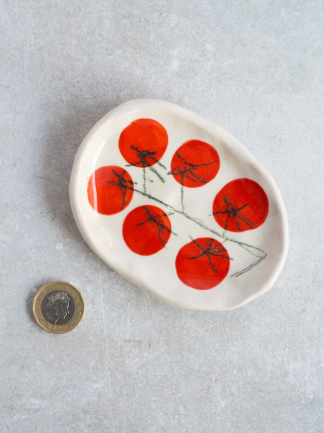 Wee Dishes. A dish with a tomato design.