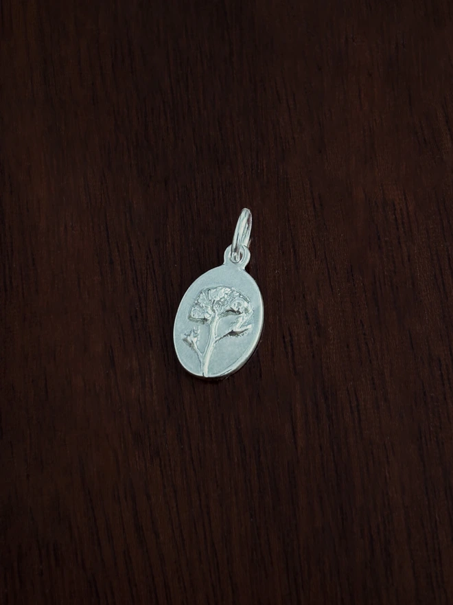 Forget me not medal charm in sterling silver