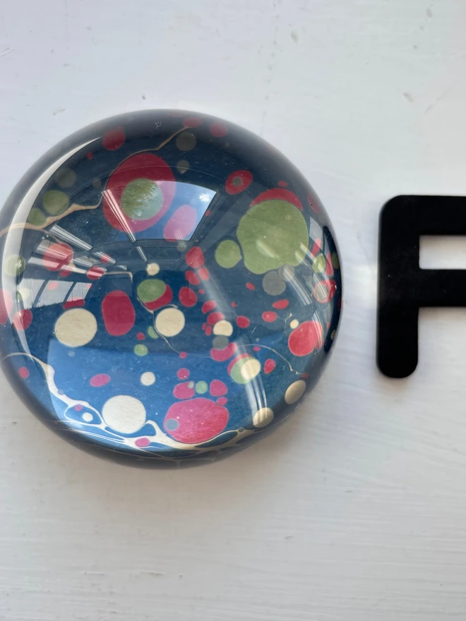 Small Paperweight. A paperweight in F