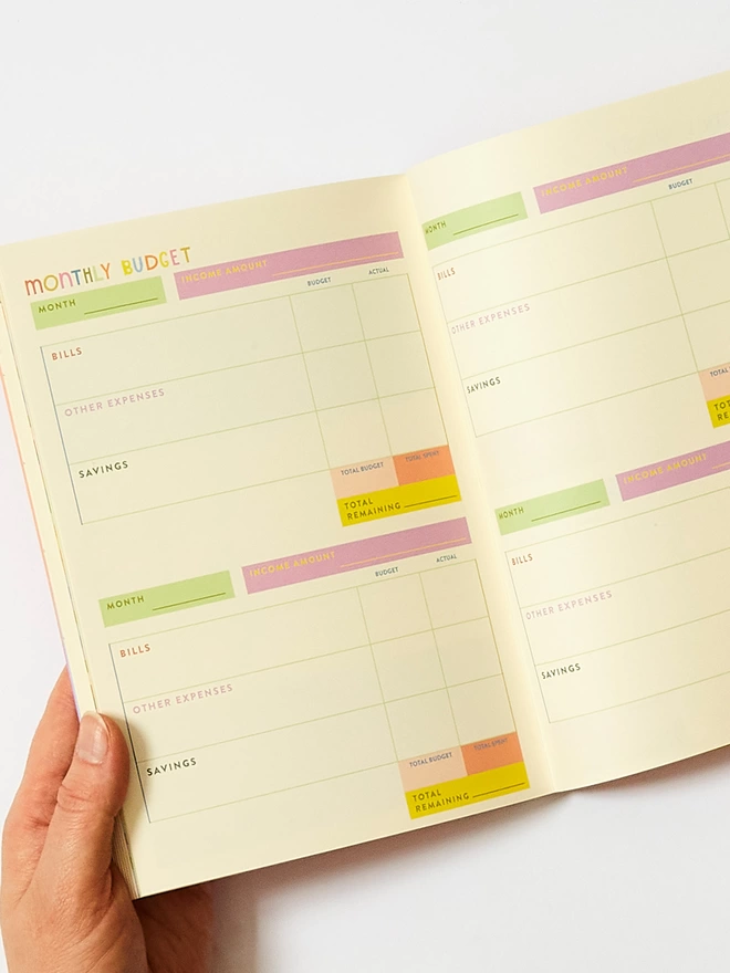 Colourful undated monthly budget spreads with space for bills, other expenses, and savings