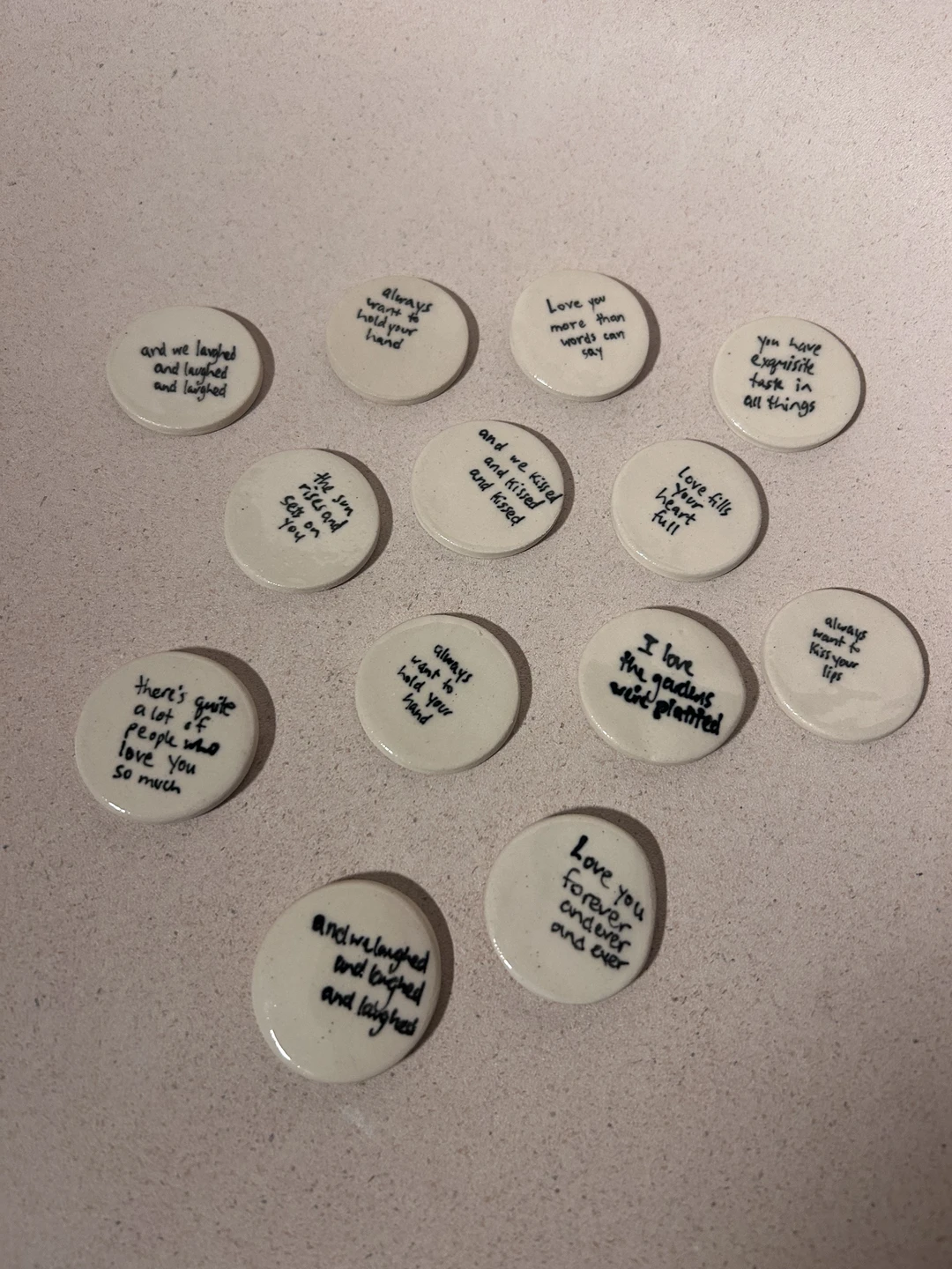 Variety of love tokens with various text.