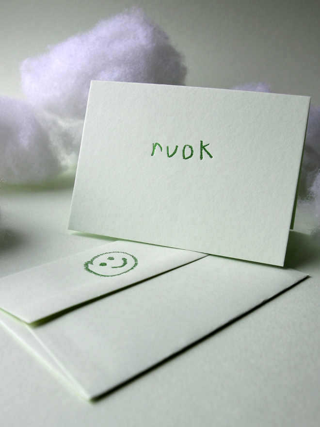 pistachio coloured card with ruok short for 'are you ok' hand foiled in kids hand writing