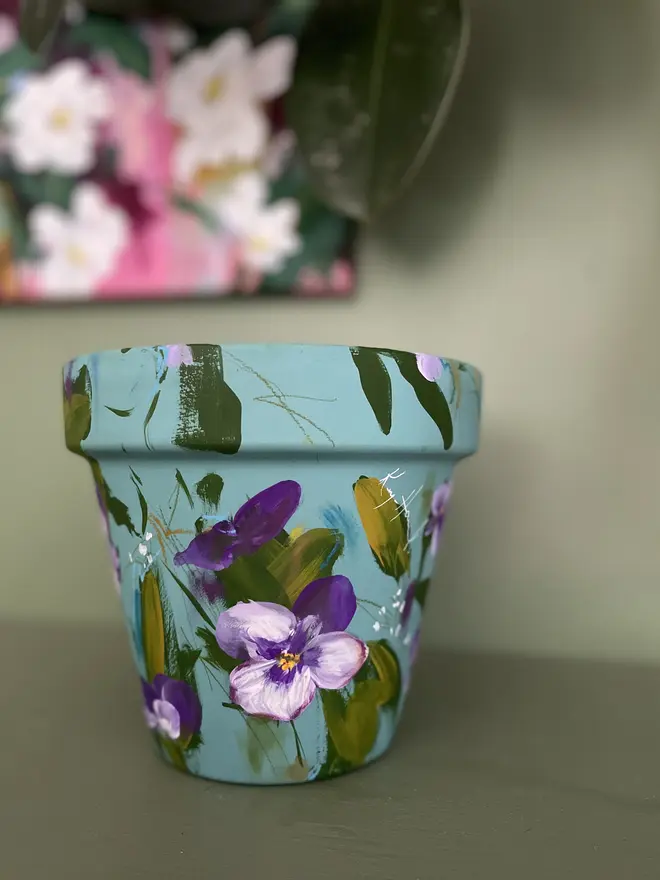 hand painted vibrant floral plant pot cornflower blue purple and white viola flowers 