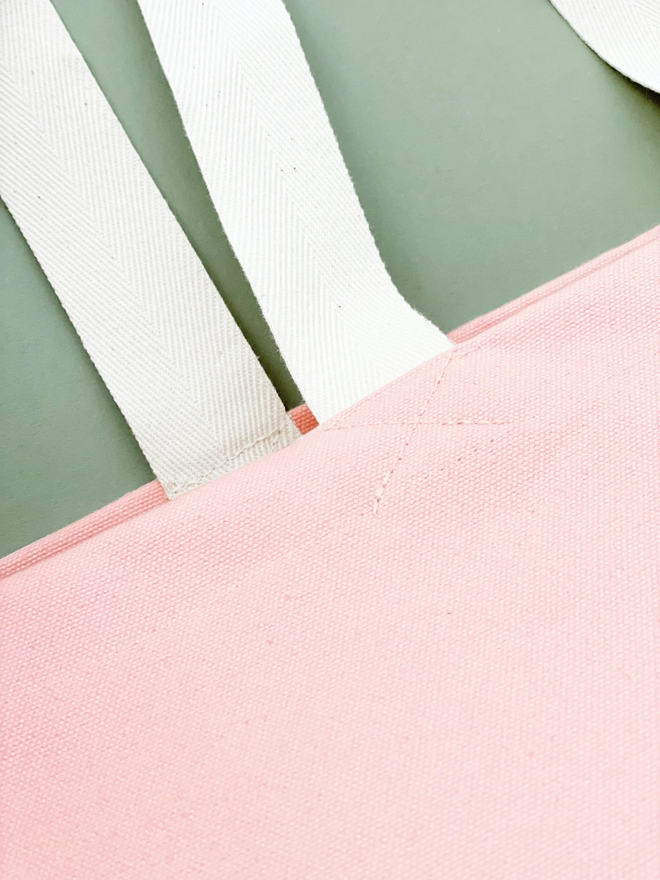 Close up of blush pink canvas tote bag