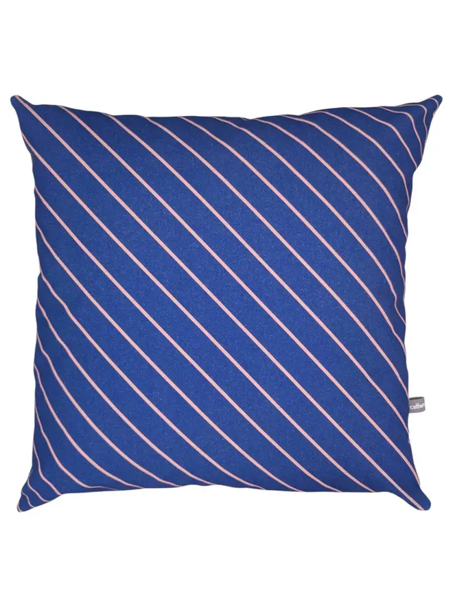 Cotton Print Patterned Cushion, a cushion sitting on a white surface. 