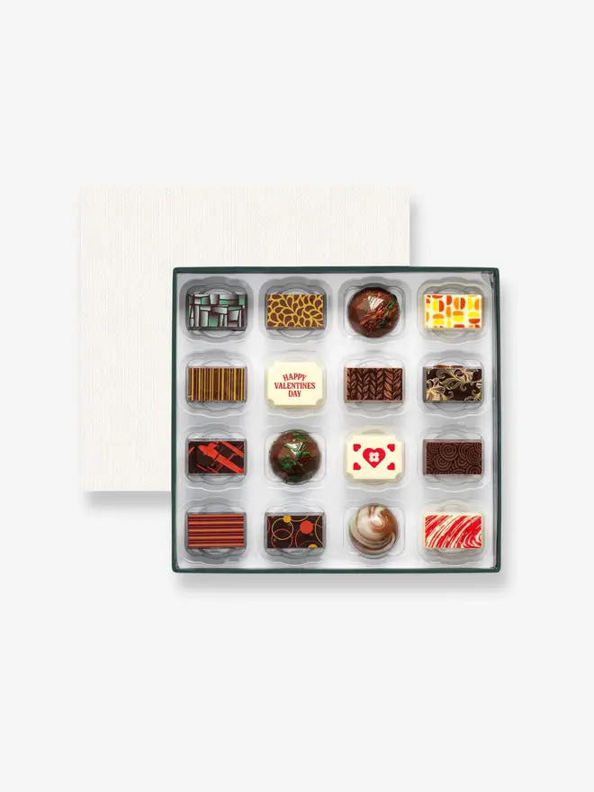A box of 16 premium chocolates with Valentine's Day designs