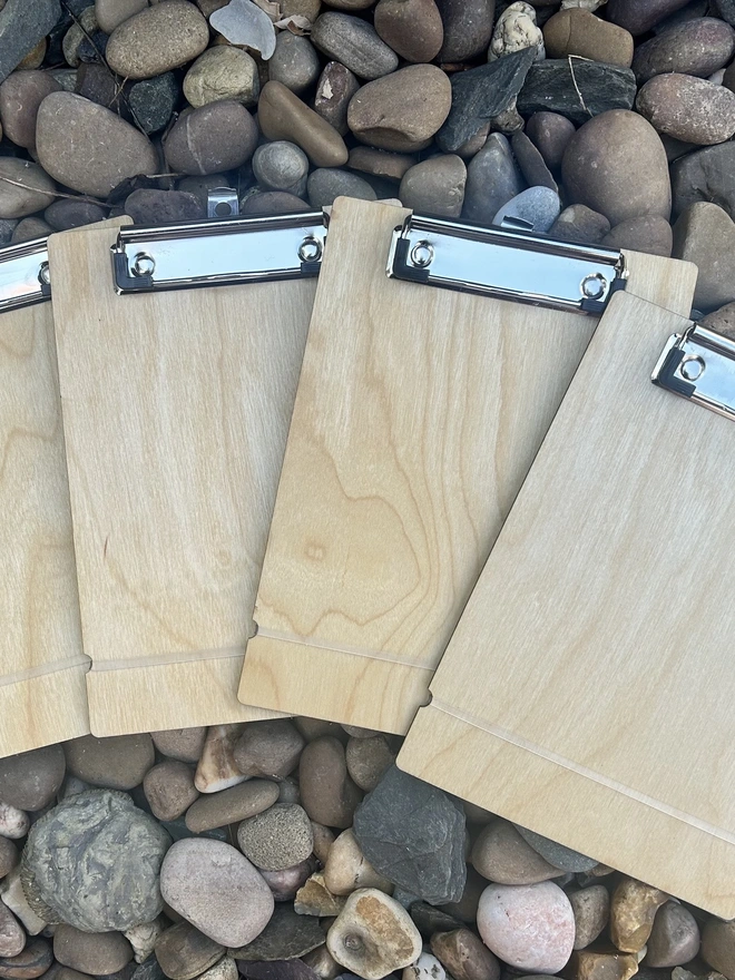 Showing the front of the clipboards with silicone band showing