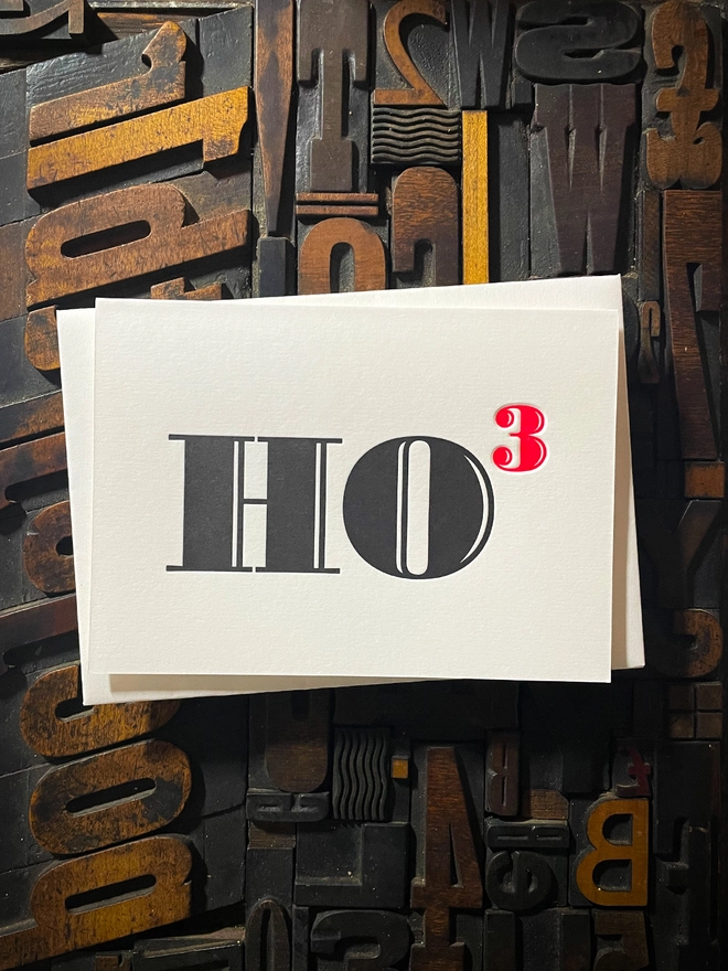 Ho Ho Ho! A beautiful typographic letterpress Christmas card. Printed in rich vibrant red and deep black inks with luxury matching and contrasting envelopes; ideal to send to your designer friends at the festive season.