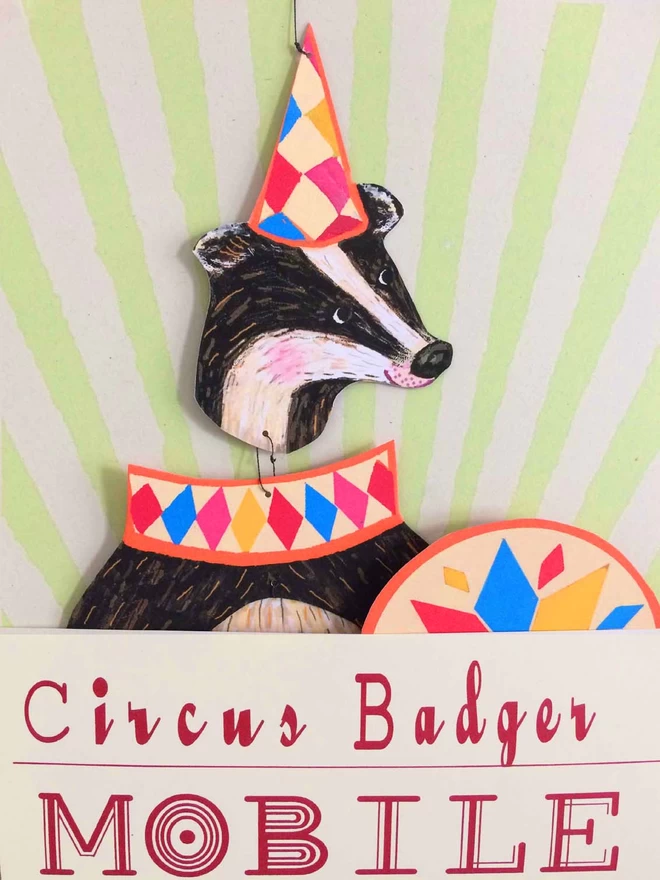 Close up picture of the badger in his colourful packaging