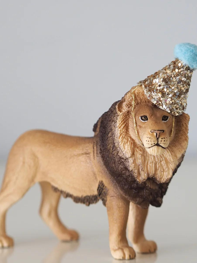 lion with a glitter gold crown.