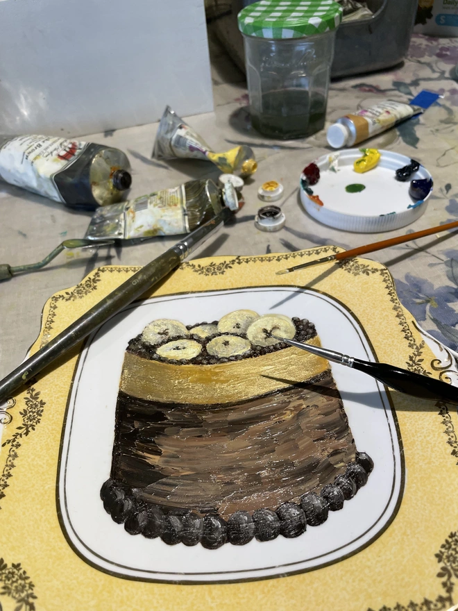 painting cake in the studio