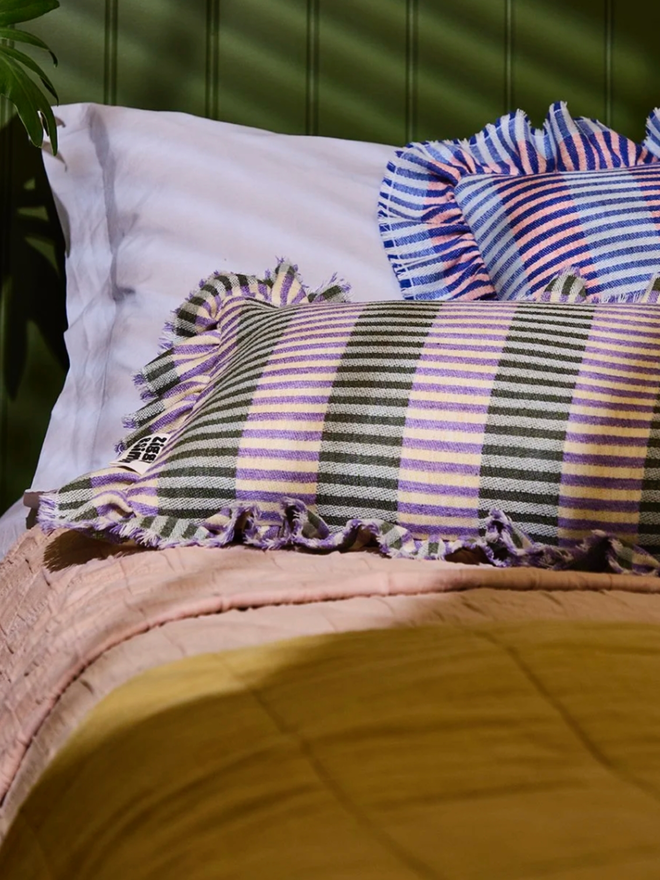 Parma Violet Cushion. A cushion in Parma Violet.