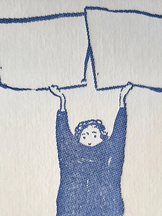 Blank Message Letterpress Handprinted Greetings Card, a white greetings card with a blue design. 