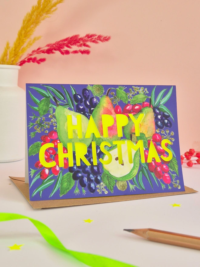 Pear illustration christmas card with Happy Christmas text, backed with neon yellow paper 