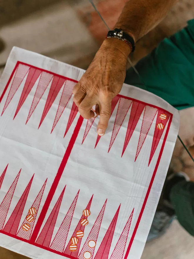 A Mr.PS backgammon board game handkerchief played with family 