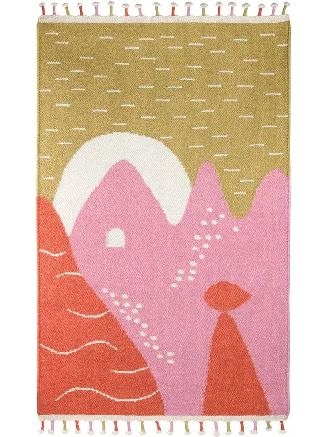 Landscape Flatweave Rug, a colourful rug sitting on a plain white surface. 