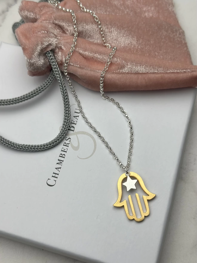 gold hamsa hand charm and sterling silver mini star with sterling silver chain