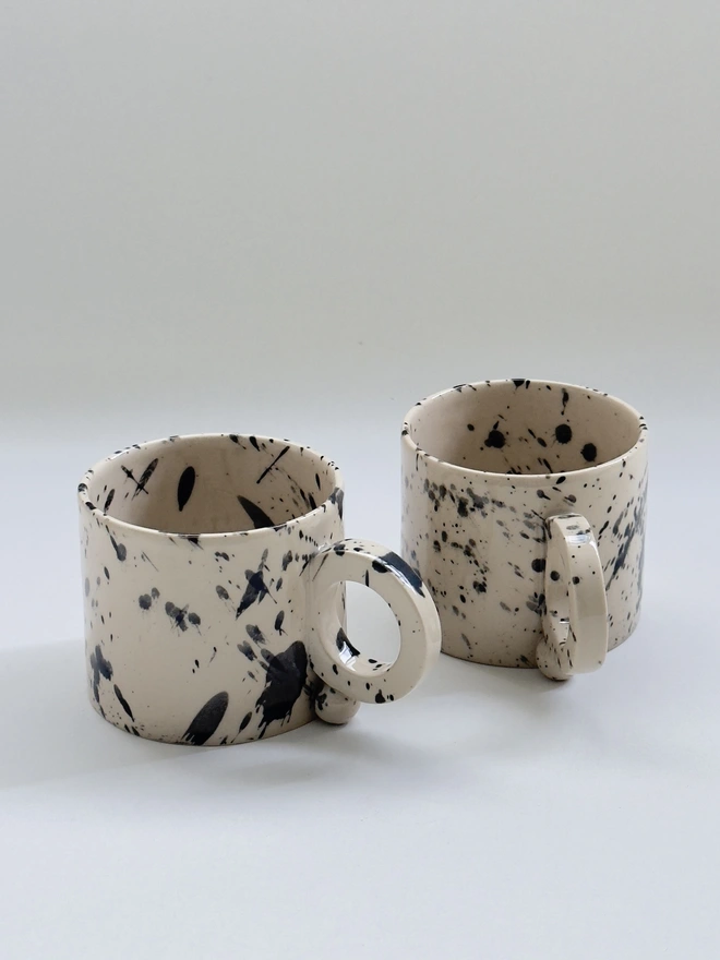 Black speckled modern ceramic mug