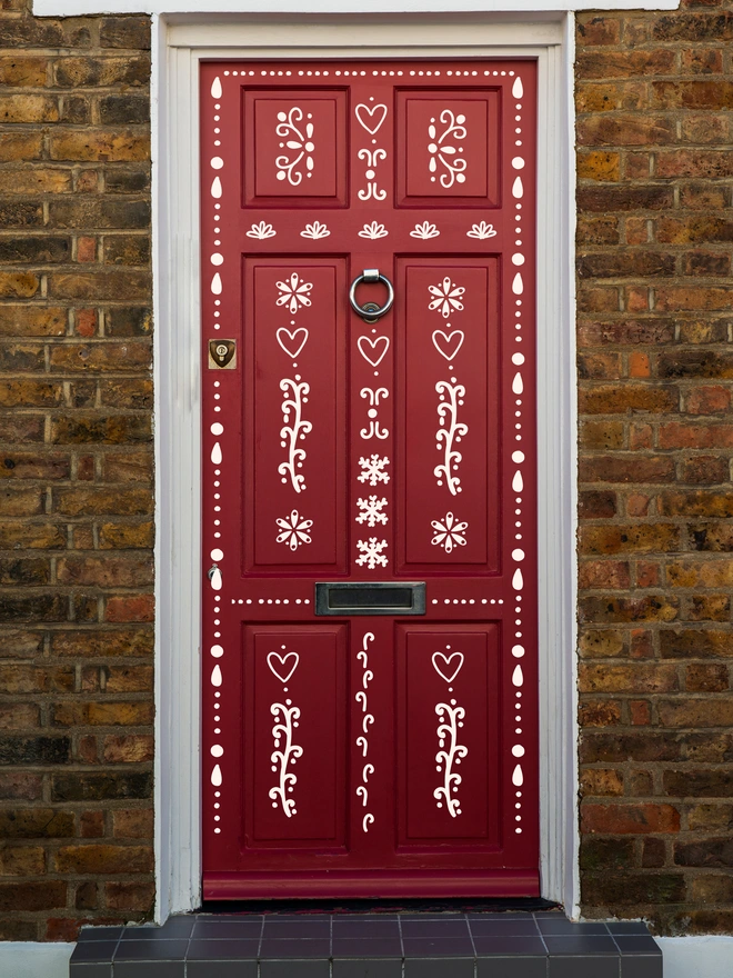 Gingerbred House Door Sticker Decal Set on a red door