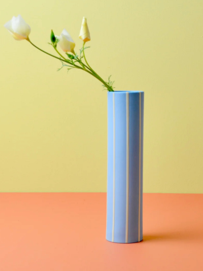Striped Vase. A thin blue striped vase.