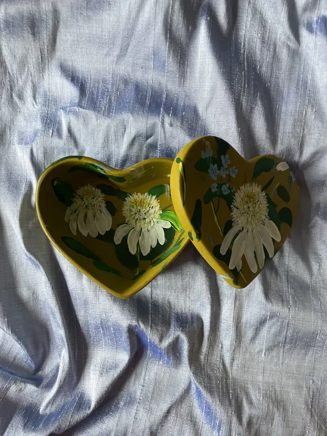 hand painted floral heart shaped keepsake box background in a olive green with white echinaceas and blue forget me not flowers