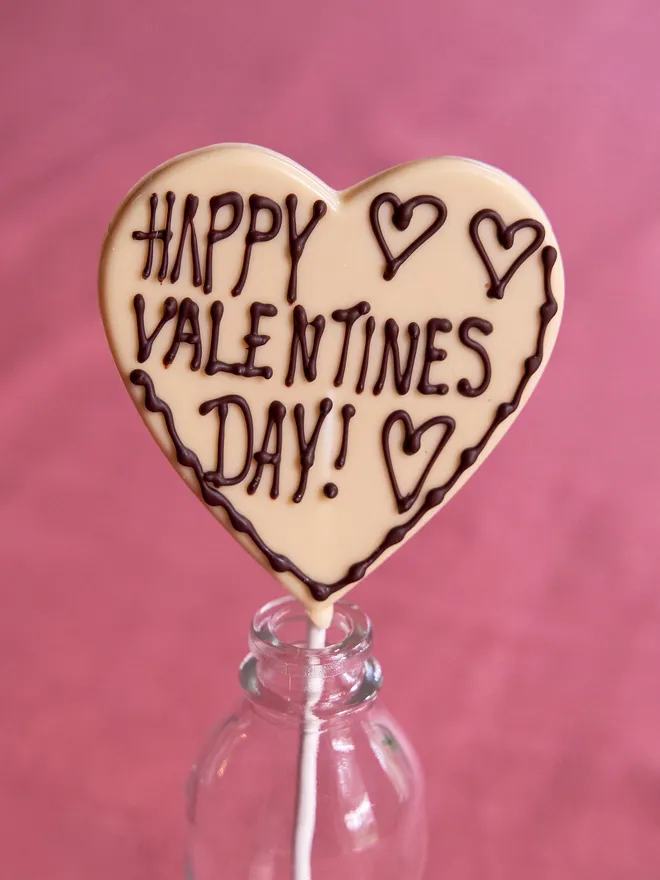 Heart shaped Happy Valentine's Day chocolate lollipop
