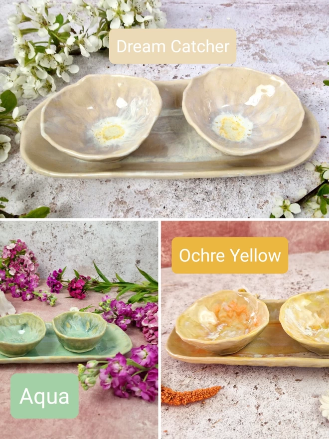 Serveware, A selection of Small serving dishes crafted from stoneware clay and glazed in ochre yellow with yellow tones, creams, whites, hints of orange. turquoise, aqua, dream catcher, Two bowls and an oval dish, tapas dish, snack dish, gift, handmade, homeware, pink background, flowers