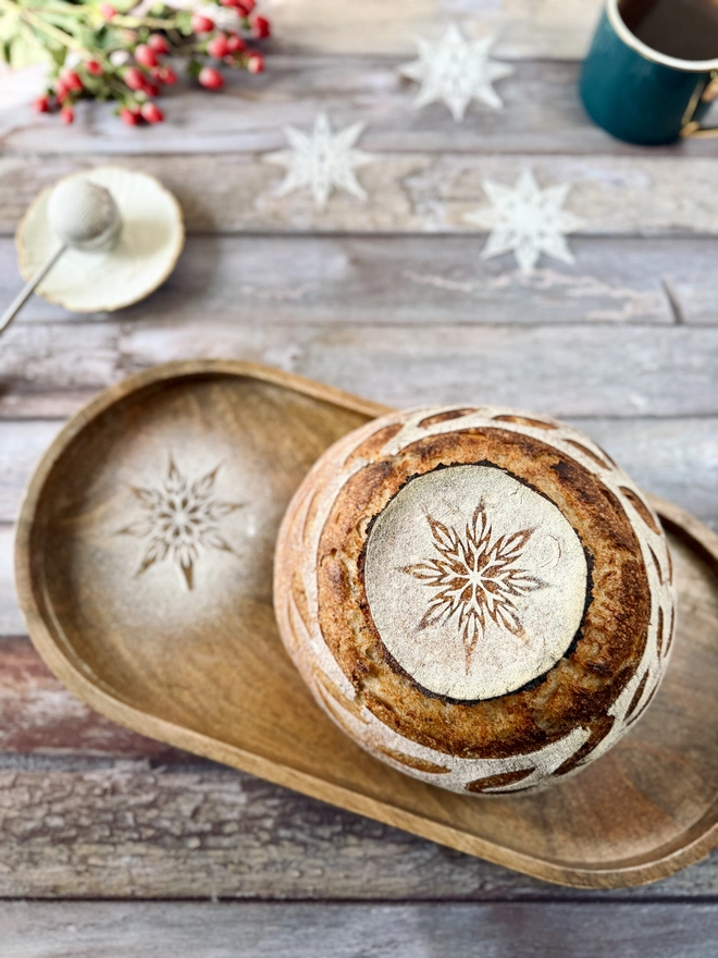 Stencilling on sourdough - baked bread