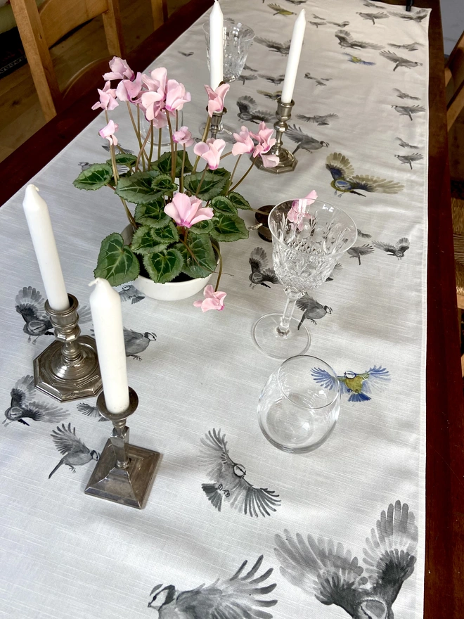 Linen tablecloth printed with hand painted wild bird design.  Made to order and printed in Britain