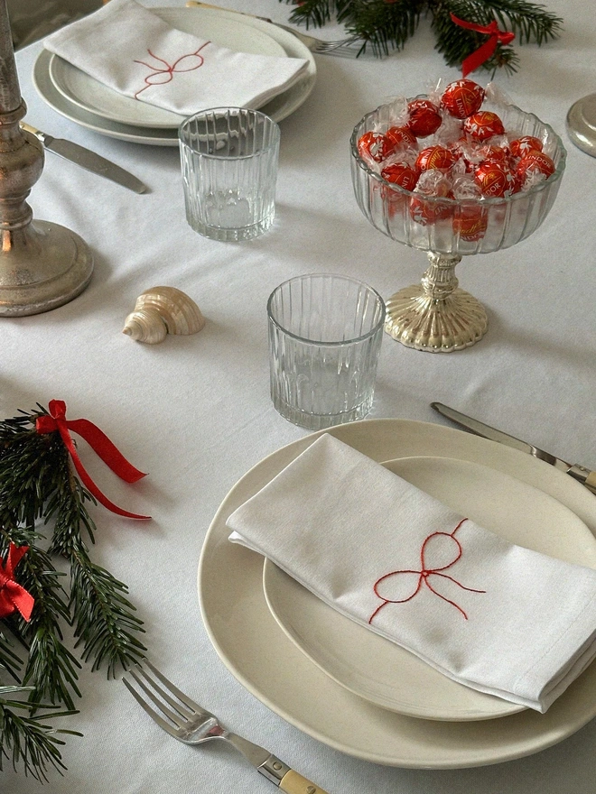 Embroidered bow napkin