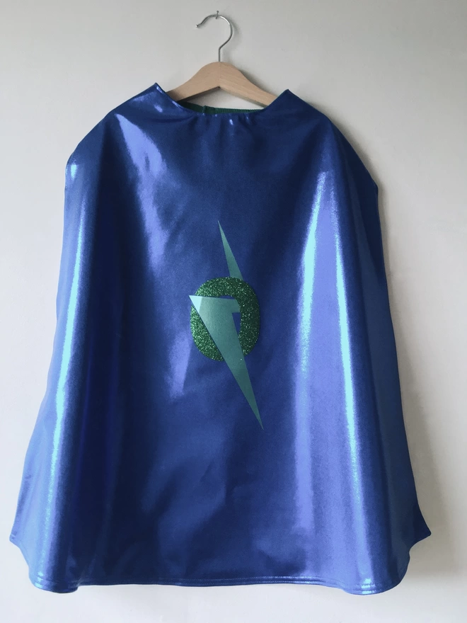 Sapphire Blue superhero cape with metallic green lightning bolt and green glitter 'O' initial