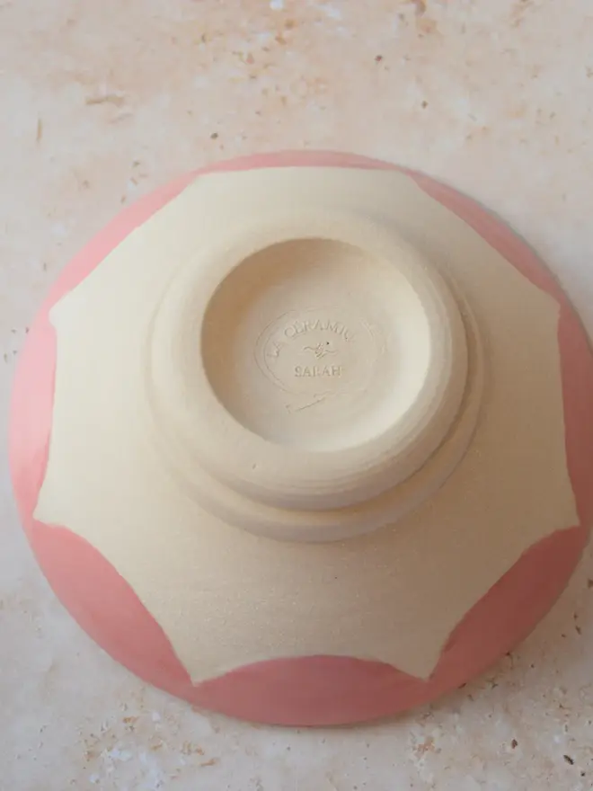 Handmade scalloped edge trinket dish - bottom view showing maker’s mark