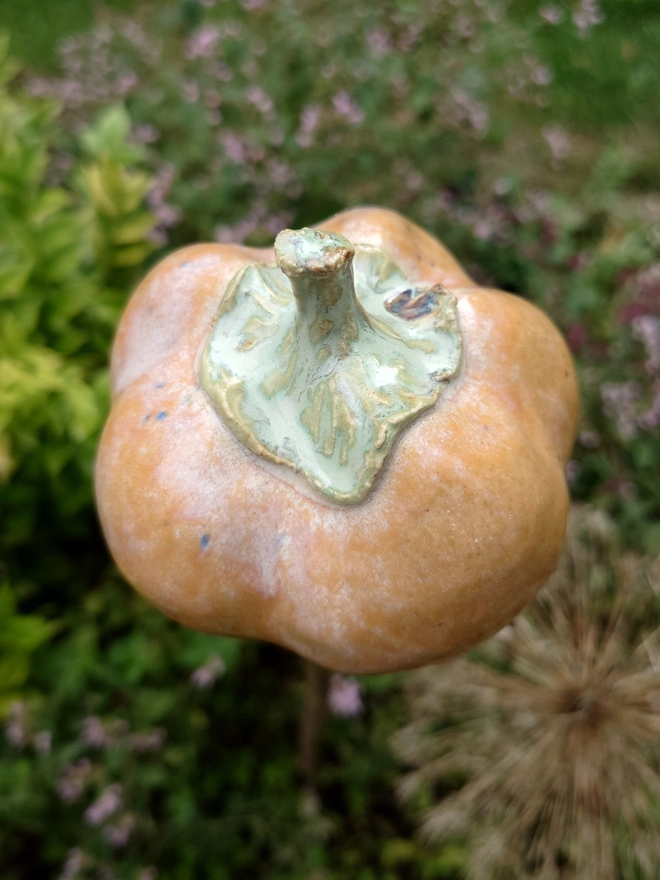 Stoneware pumpkin garden cane topper