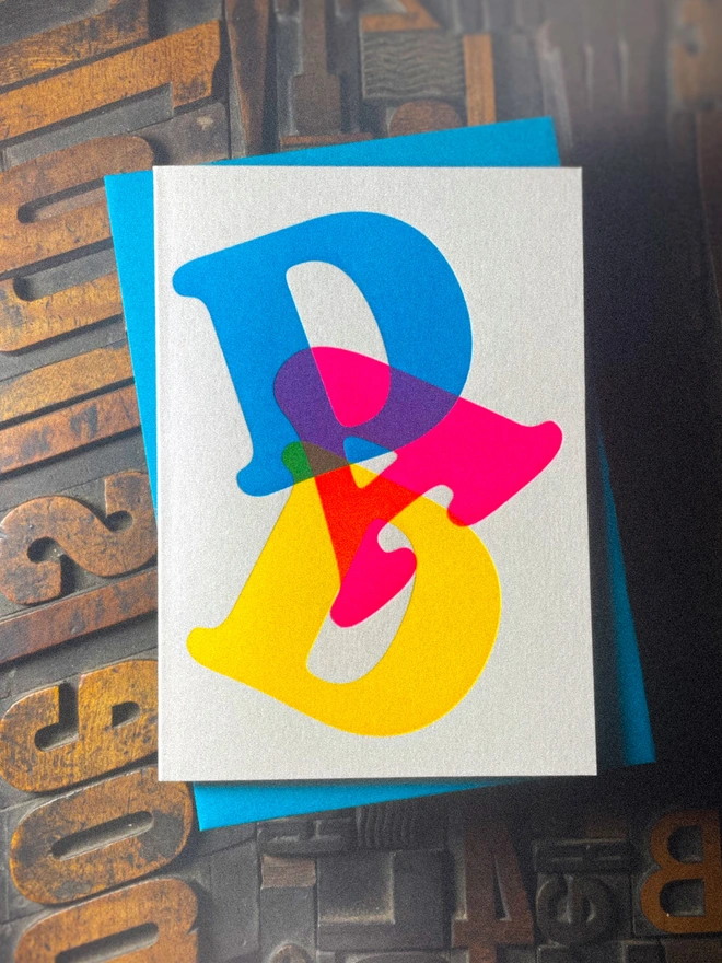 Fathers day typographic letterpress card with fluorescent ink. Deep impression print. Unique with no print being the same. Vibrant colours with matching premium envelopes. With luxurious contrasting coloured envelopes.