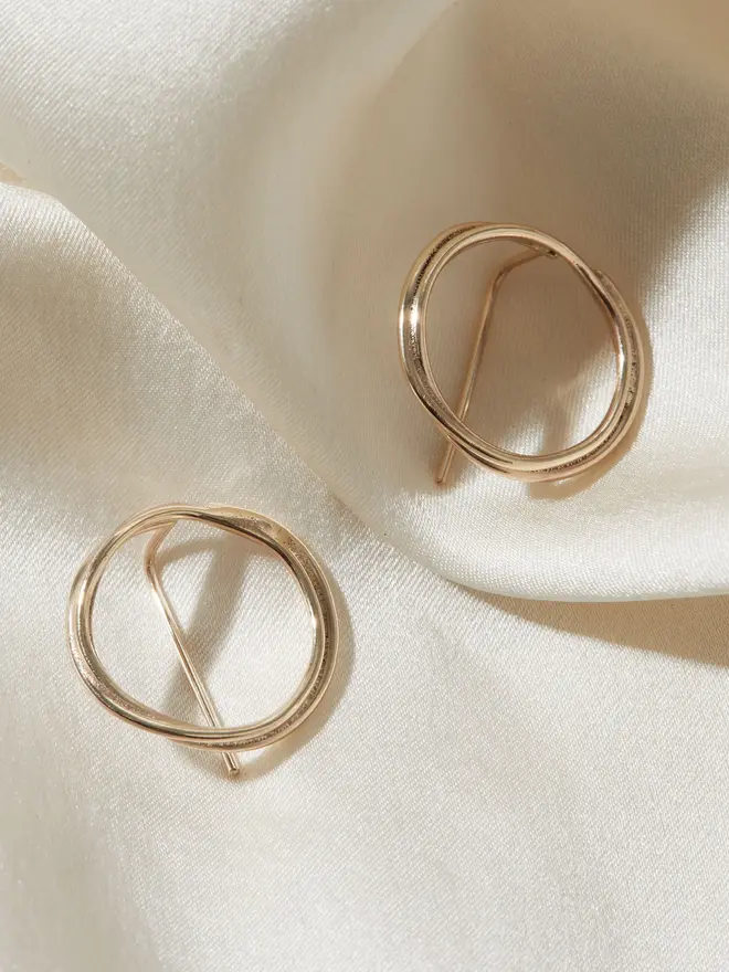 Solid 9ct Gold Organic Circle Threader Earrings on a silk material