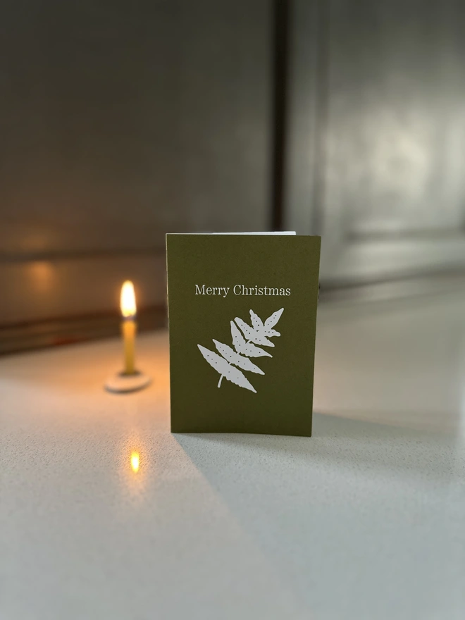 Moss green botanical Christmas gift card by Bohemia & Flower with personalised message option, perfect for gifting