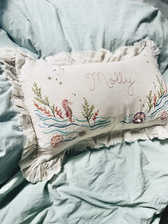 Under the sea, hand embroidered cushion on natural linen with personalised name 