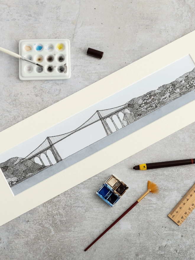 Print of a detailed pen and watercolour drawing of the Menai Bridge, North Wales in a soft white mount