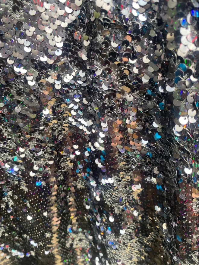 Petrol Black Holographic Sequin V-neck Kaftan Gown material up close.