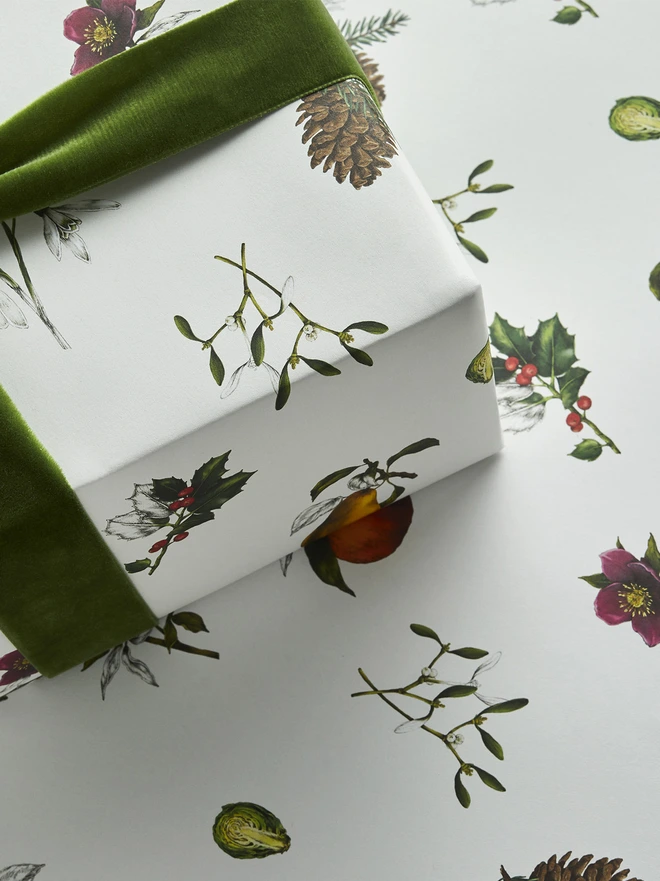 white base spaced out christmas pattern wrap with festive botanical elements 
