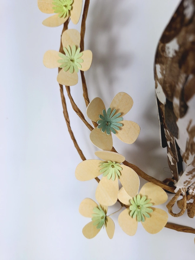 close up of warm yellow tree blossom paper flowers