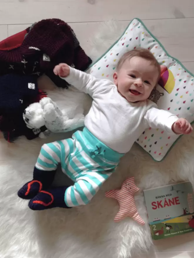 Baby booties with heart embroidery