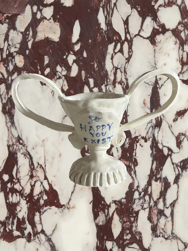 So happy you exist mini ceramic trophy in blue